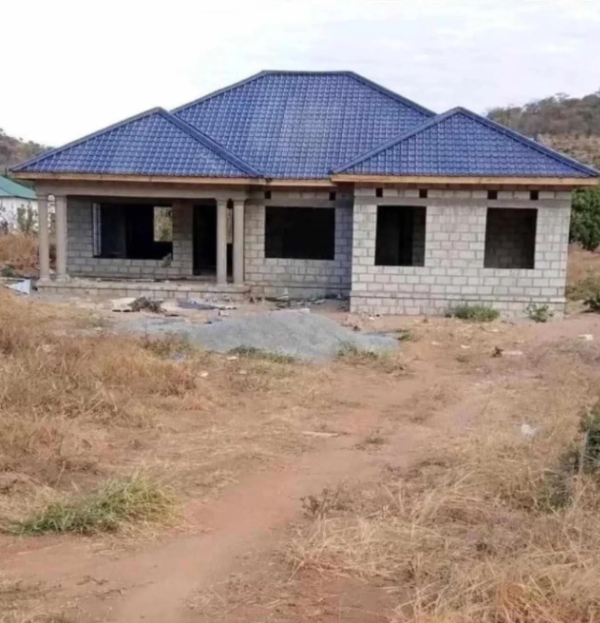 Blue stone-coat tile roof on a new Liberian residence